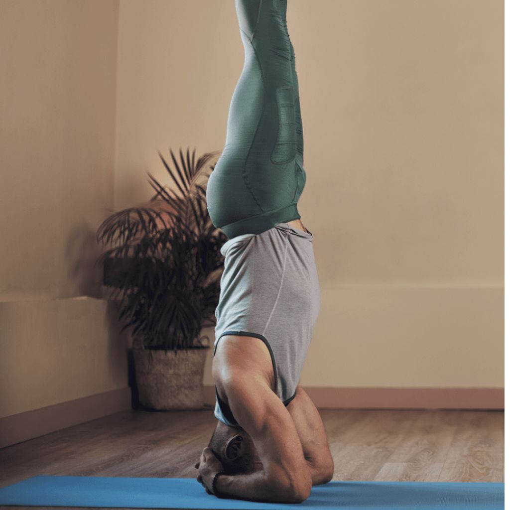 A Man doing Sirsasana