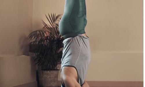 A Man doing Sirsasana