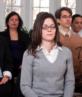 corporate people meditating