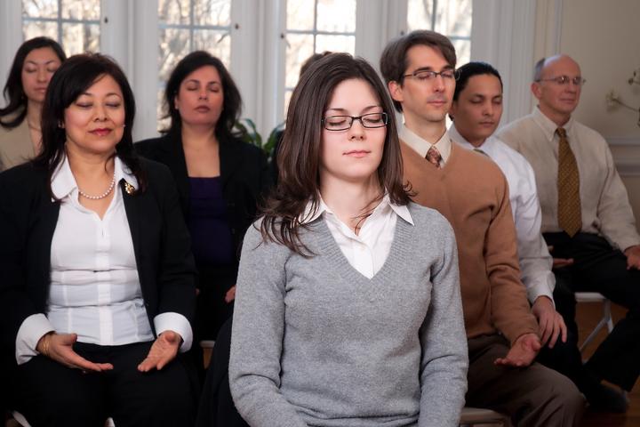 corporate people meditating