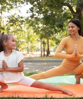 full-shot-smiley-girl-woman-doing-yoga1